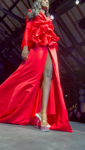 HOK House Of KLynn Couture Rich Satin Dramatic Red Luxury Ruffled Tuxedo Gown Open Back Flowing Train Evening Event Gala Vogue Runway Top Looks Lifestyle Holiday Party New Years Eve Birthday Red Carpet Style Inspiration Cover Model Designer Box Office