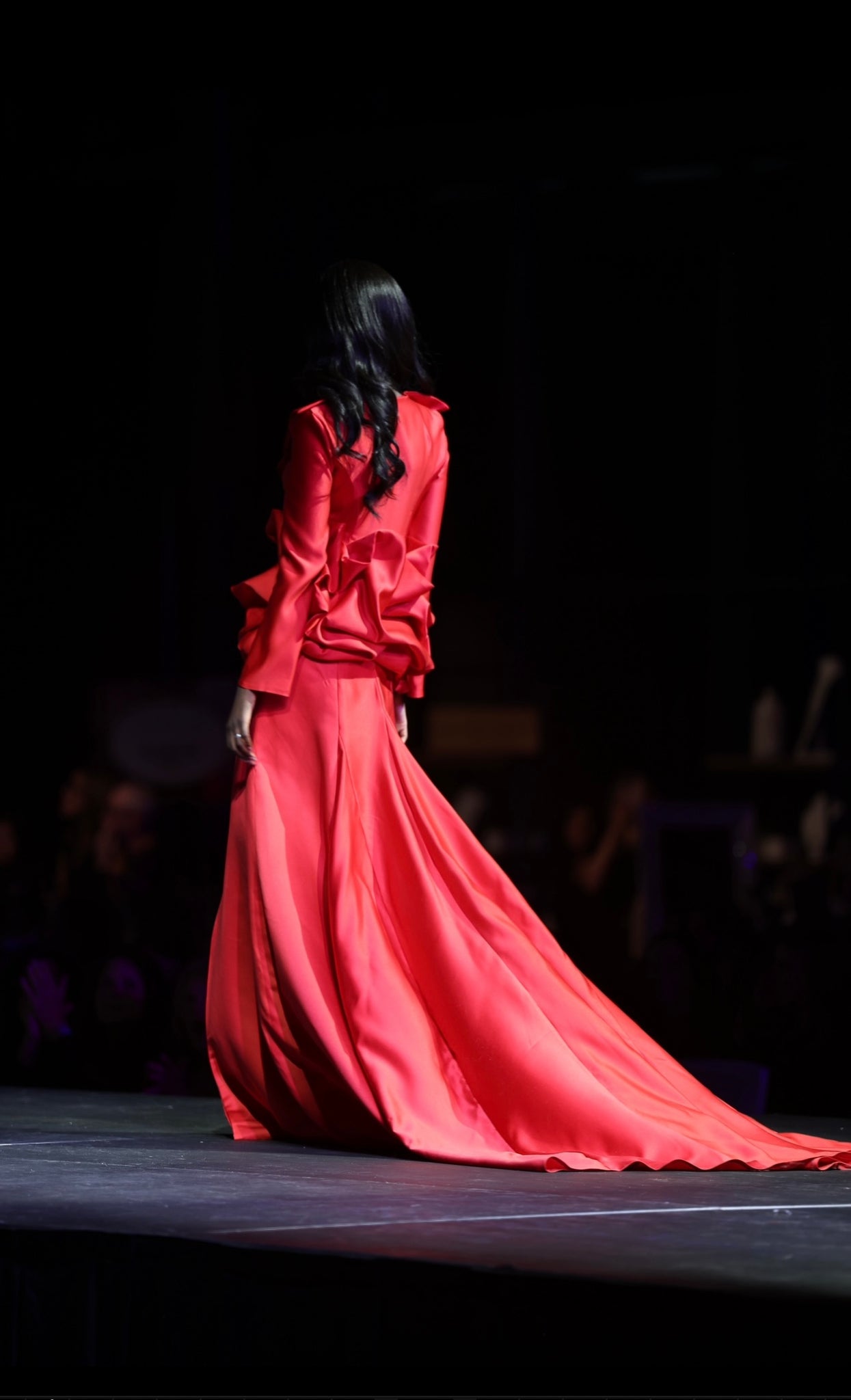 HOK House Of KLynn Couture Rich Satin Dramatic Red Luxury Ruffled Tuxedo Gown Open Back Flowing Train Evening Event Gala Vogue Runway Top Looks Lifestyle Holiday Party New Years Eve Birthday Red Carpet Style Inspiration Cover Model Designer Box Office