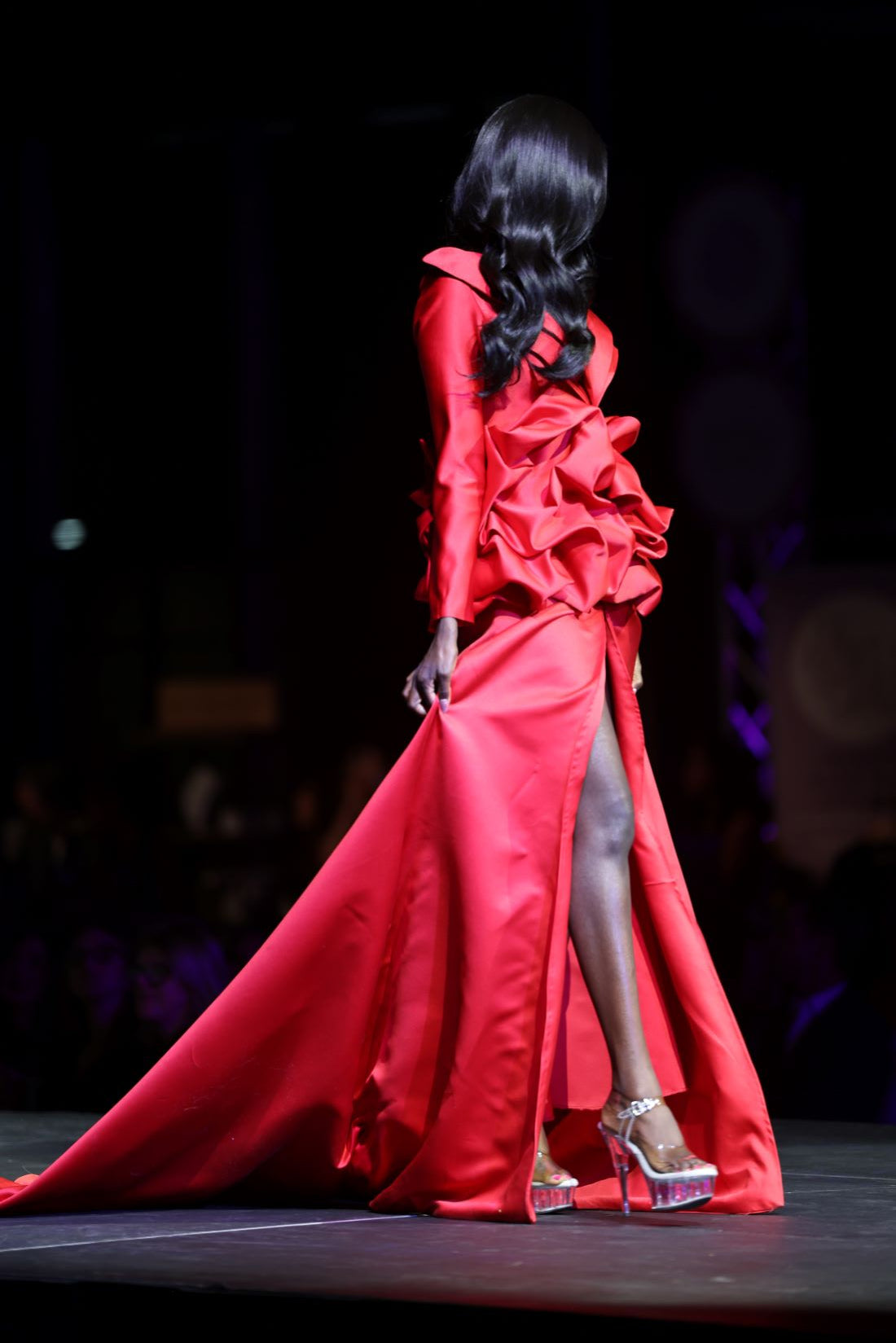 HOK House Of KLynn Couture Rich Satin Dramatic Red Luxury Ruffled Tuxedo Gown Flowing Train Evening Event Gala Vogue Runway Top Looks Lifestyle Holiday Party New Years Eve Red Carpet Style Inspiration Designer Old Money Award Show Winner Nominees IMDB